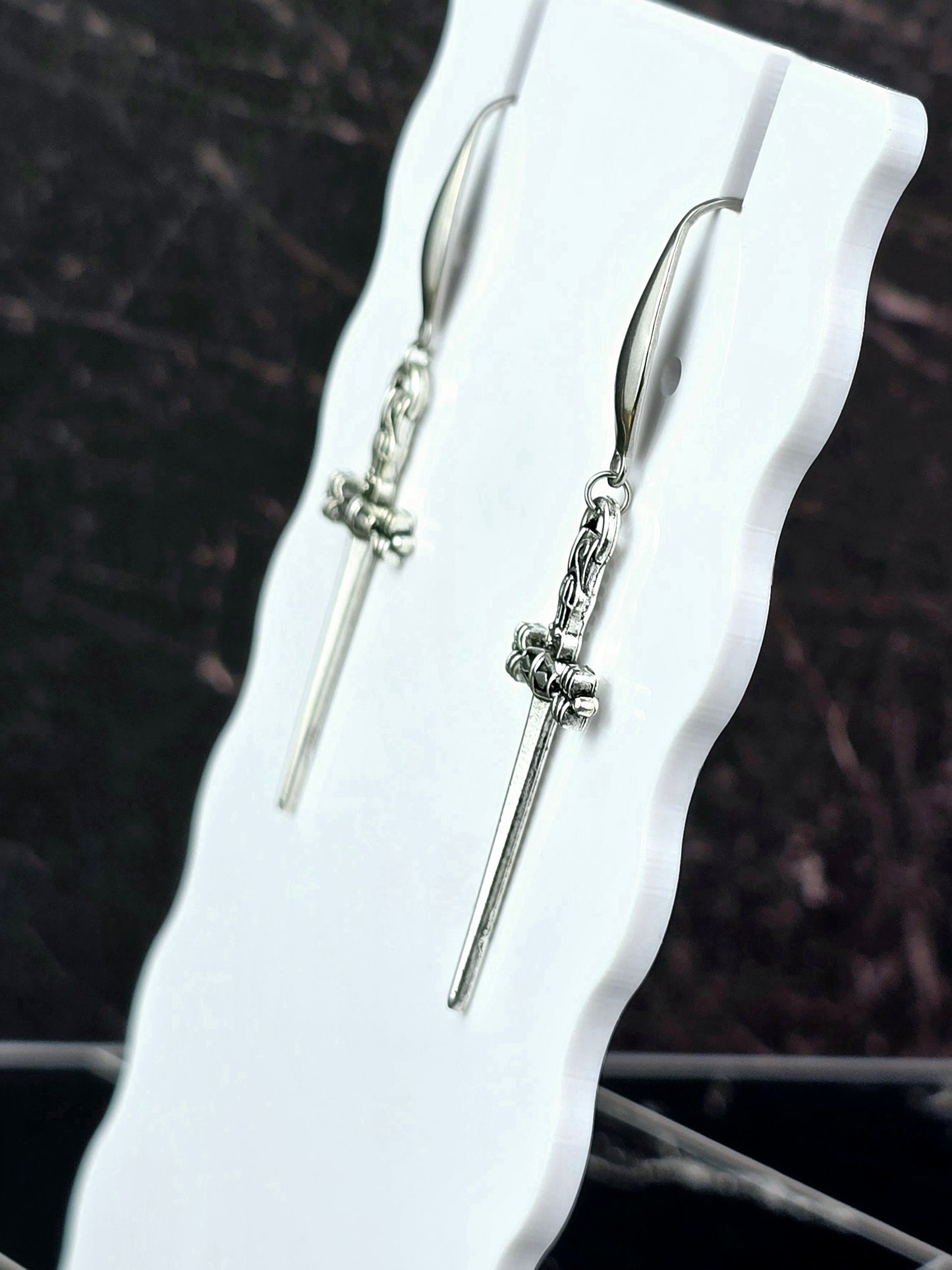 Silver Dangle Dagger Earrings.