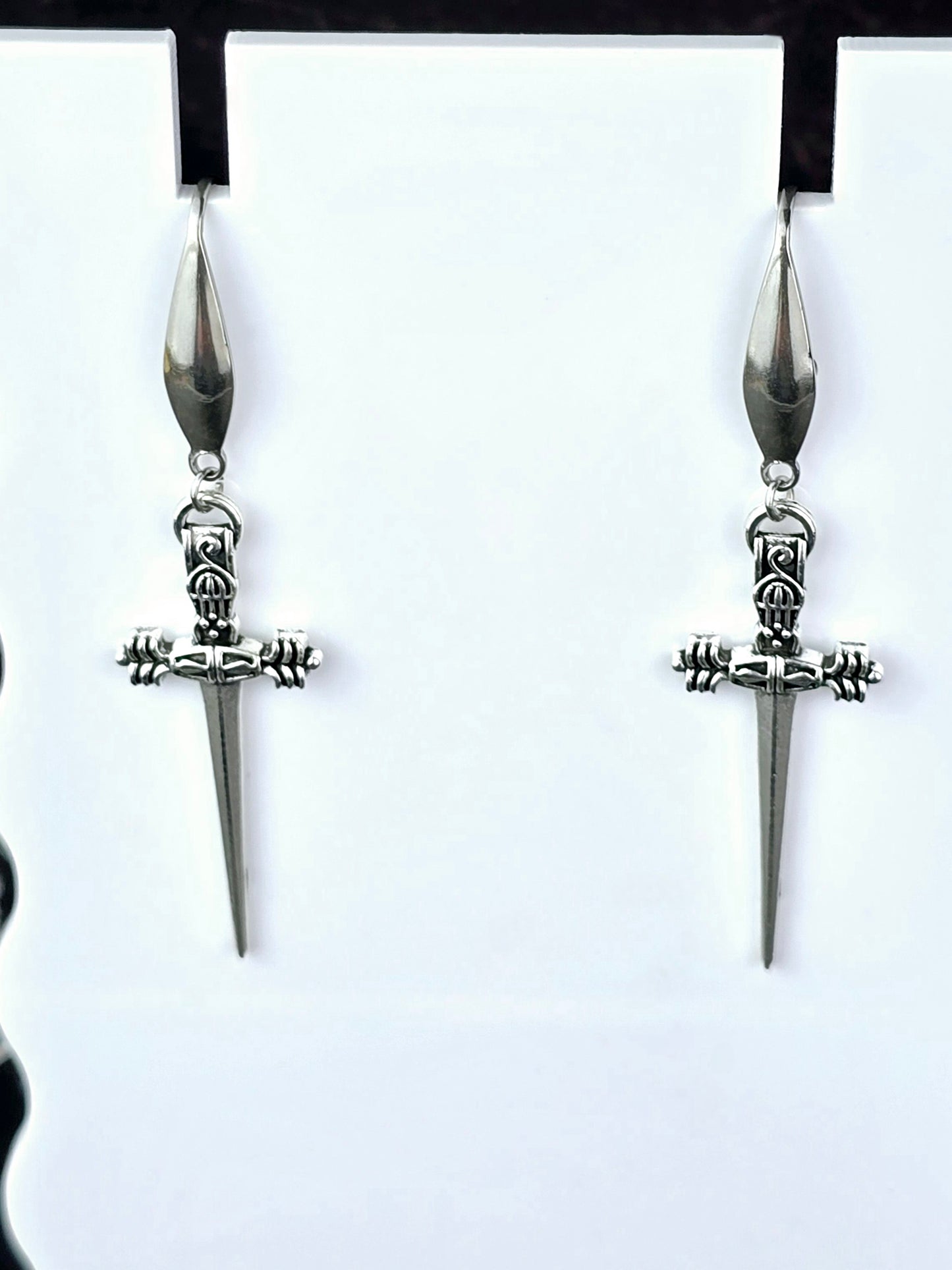 Silver Dangle Dagger Earrings.