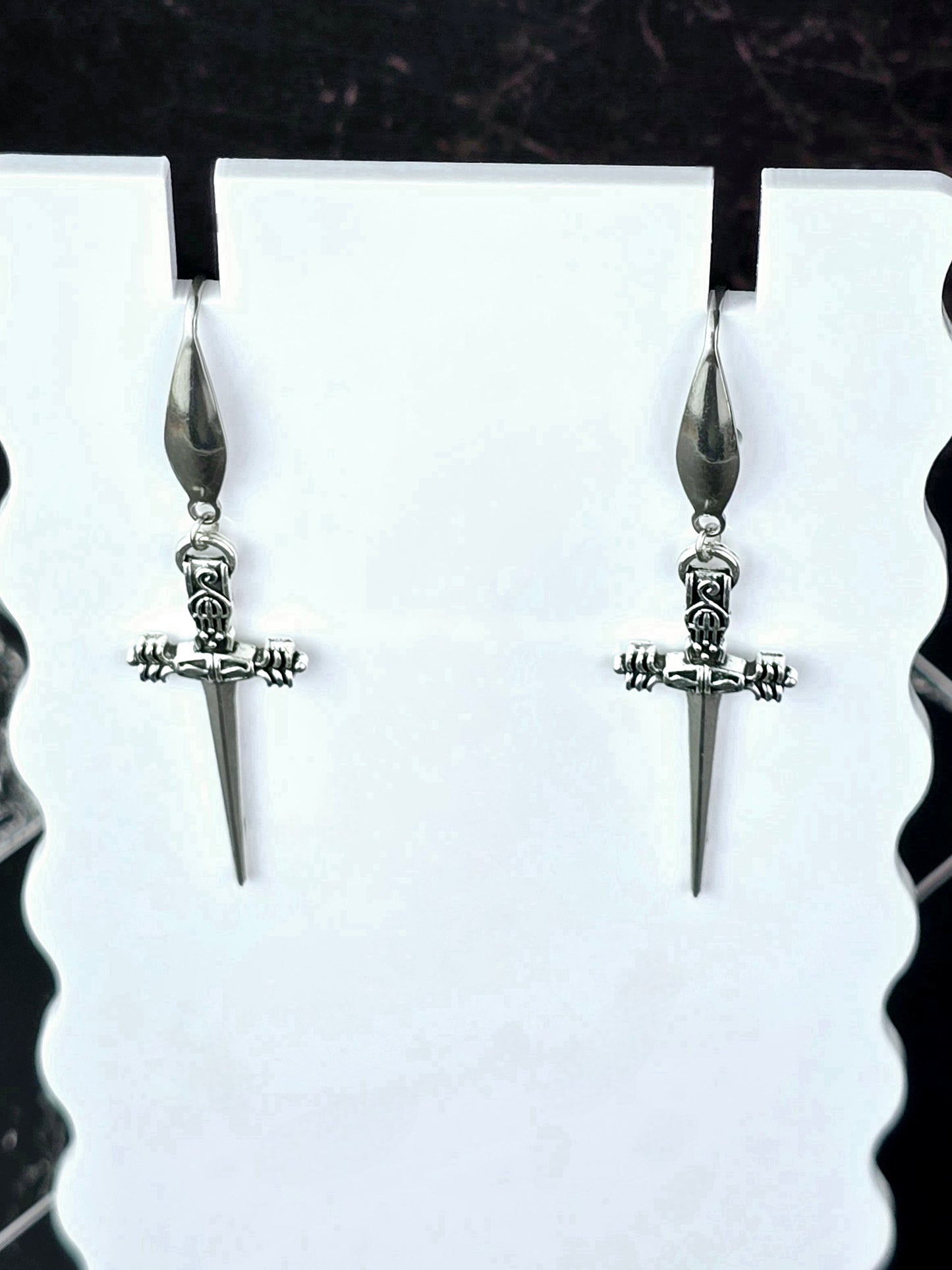 Silver Dangle Dagger Earrings.