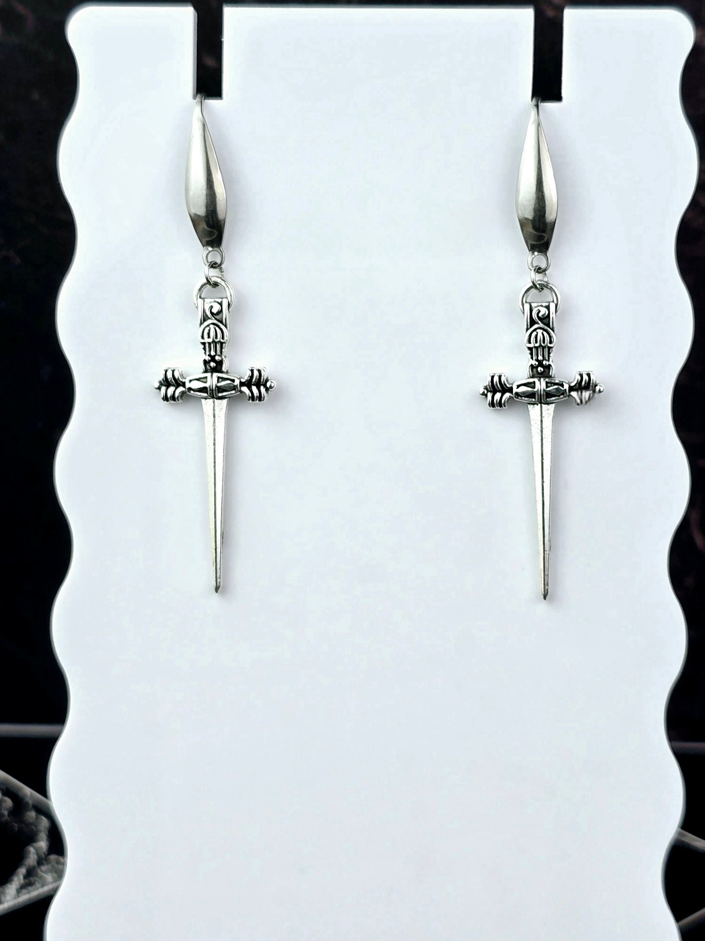Silver Dangle Dagger Earrings.