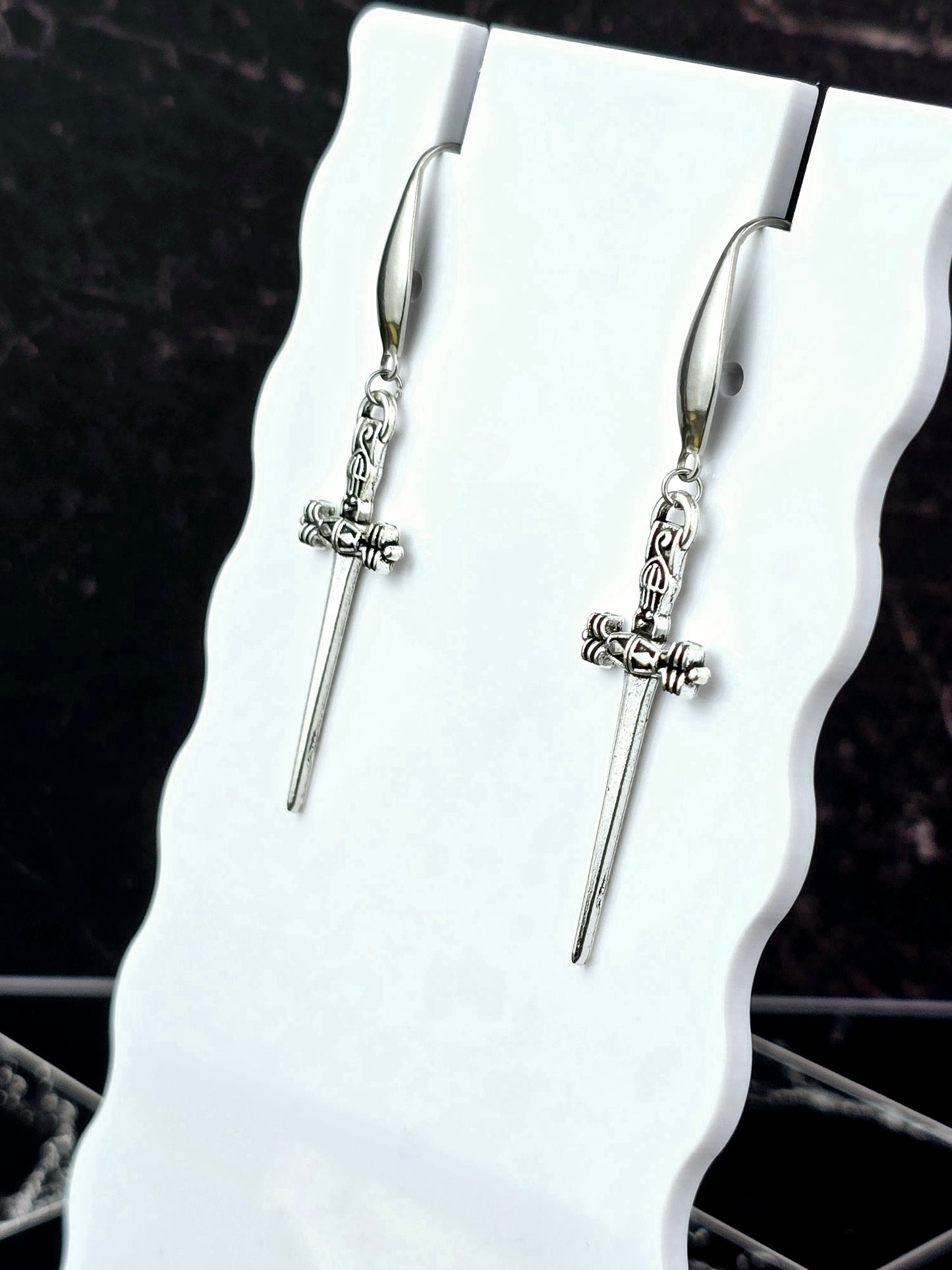 Silver Dangle Dagger Earrings.