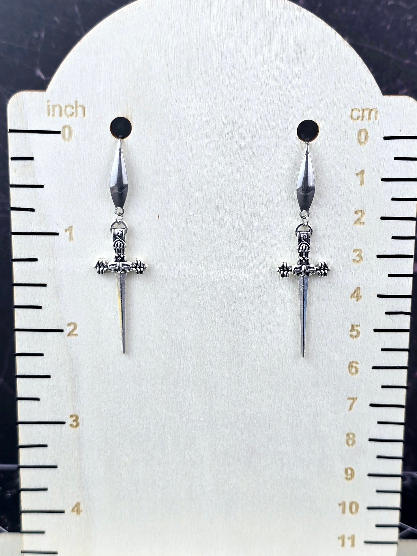 Silver Dangle Dagger Earrings.