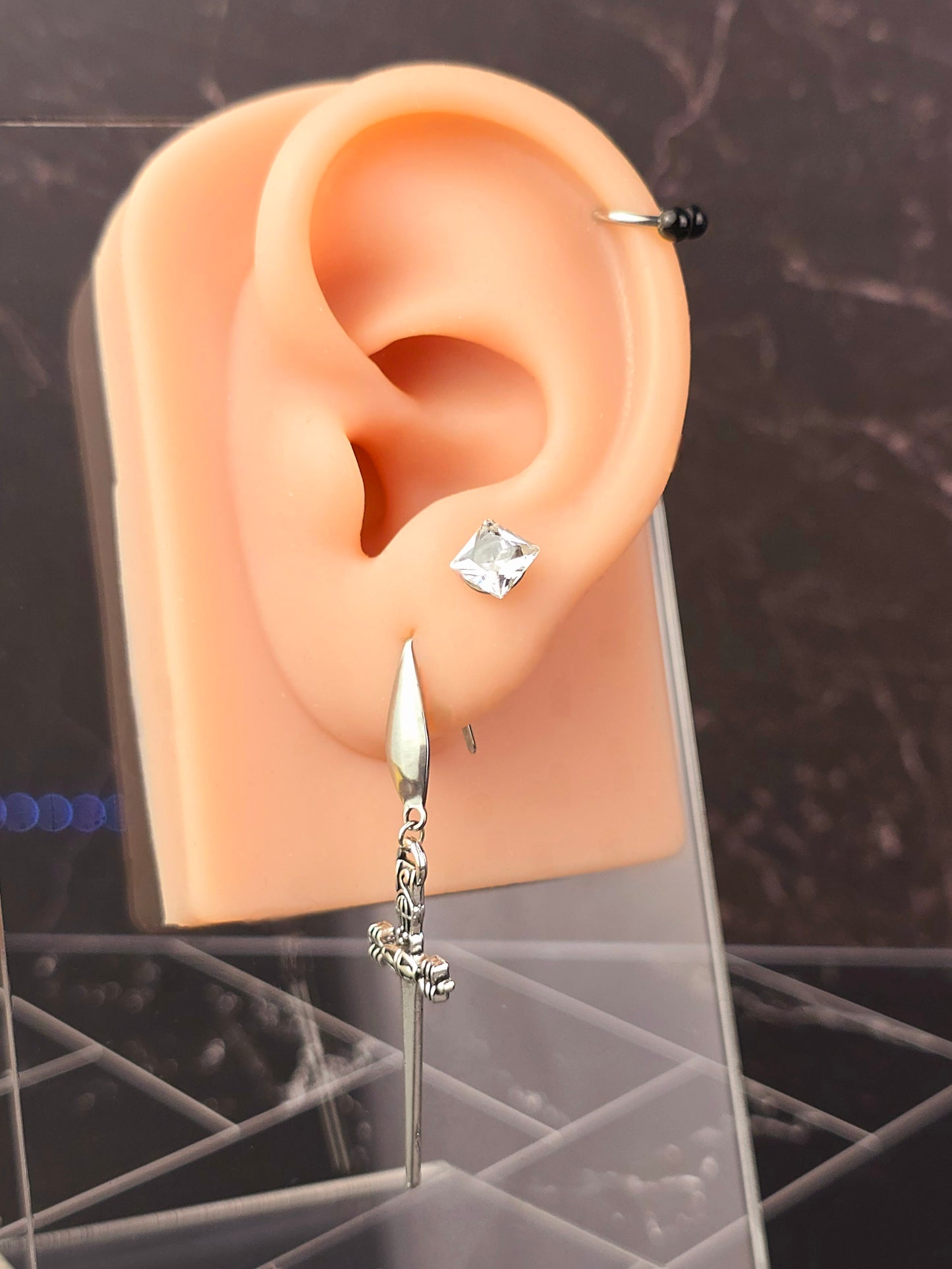 Silver Dangle Dagger Earrings.