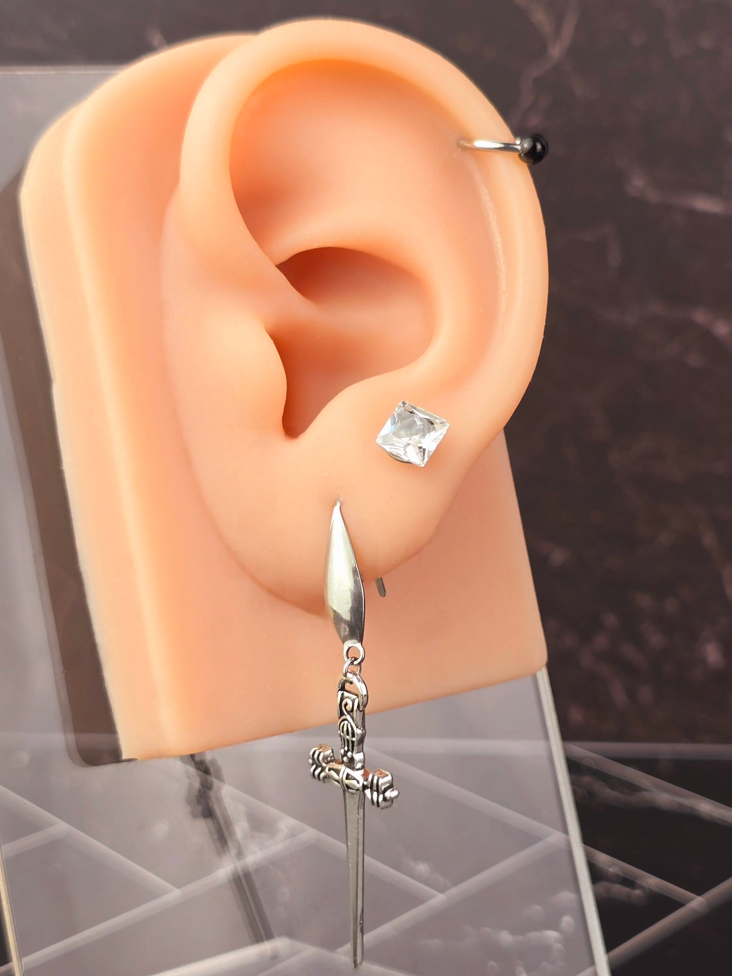Silver Dangle Dagger Earrings.