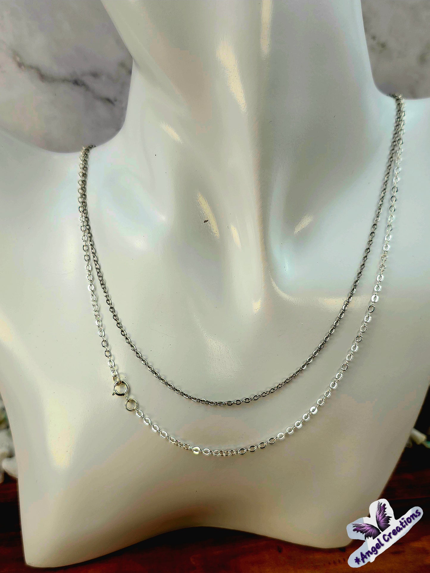 Sterling Silver Necklace Featuring A Turquoise Stone.