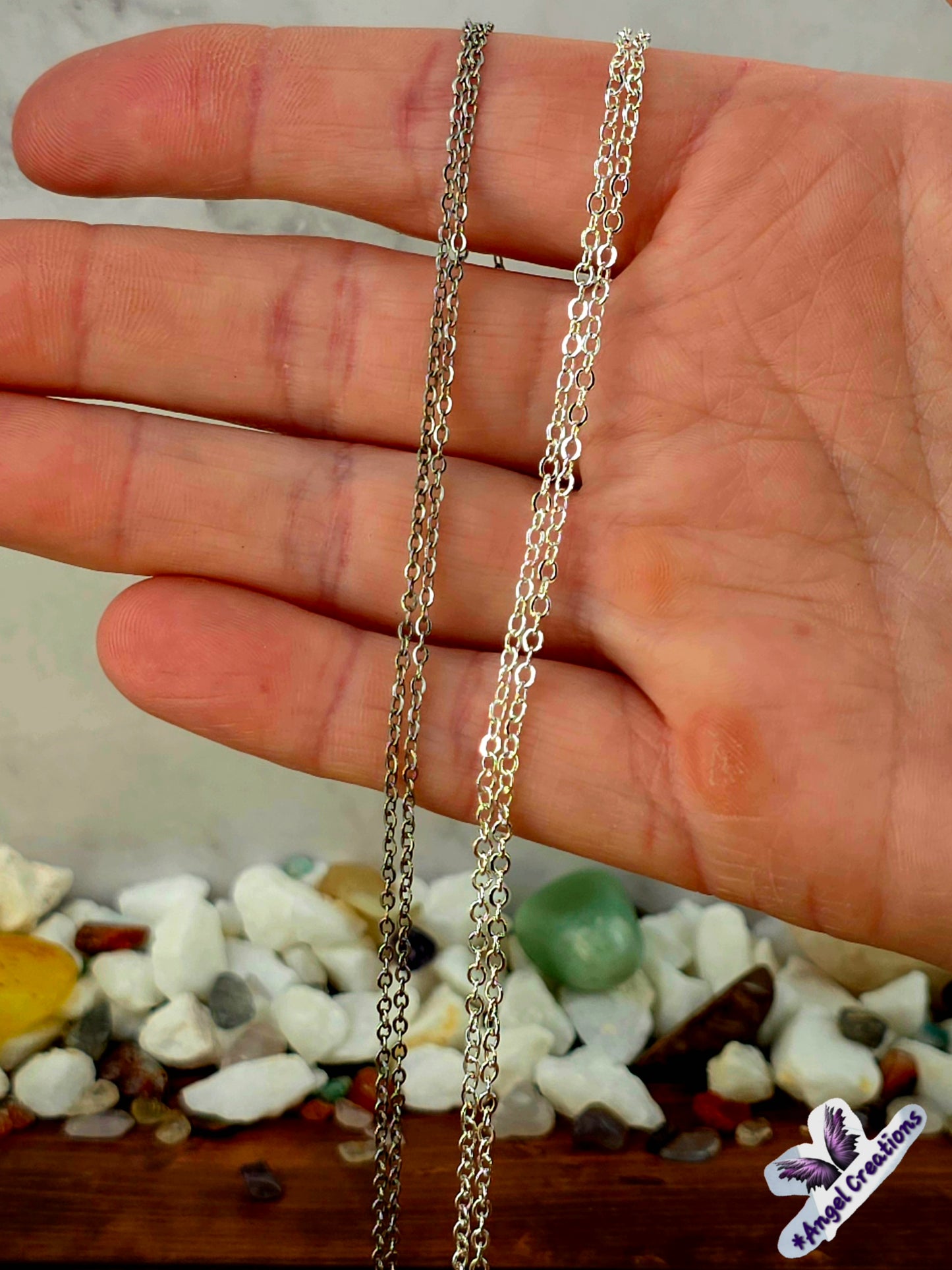 Sterling Silver Necklace Featuring A Turquoise Stone.