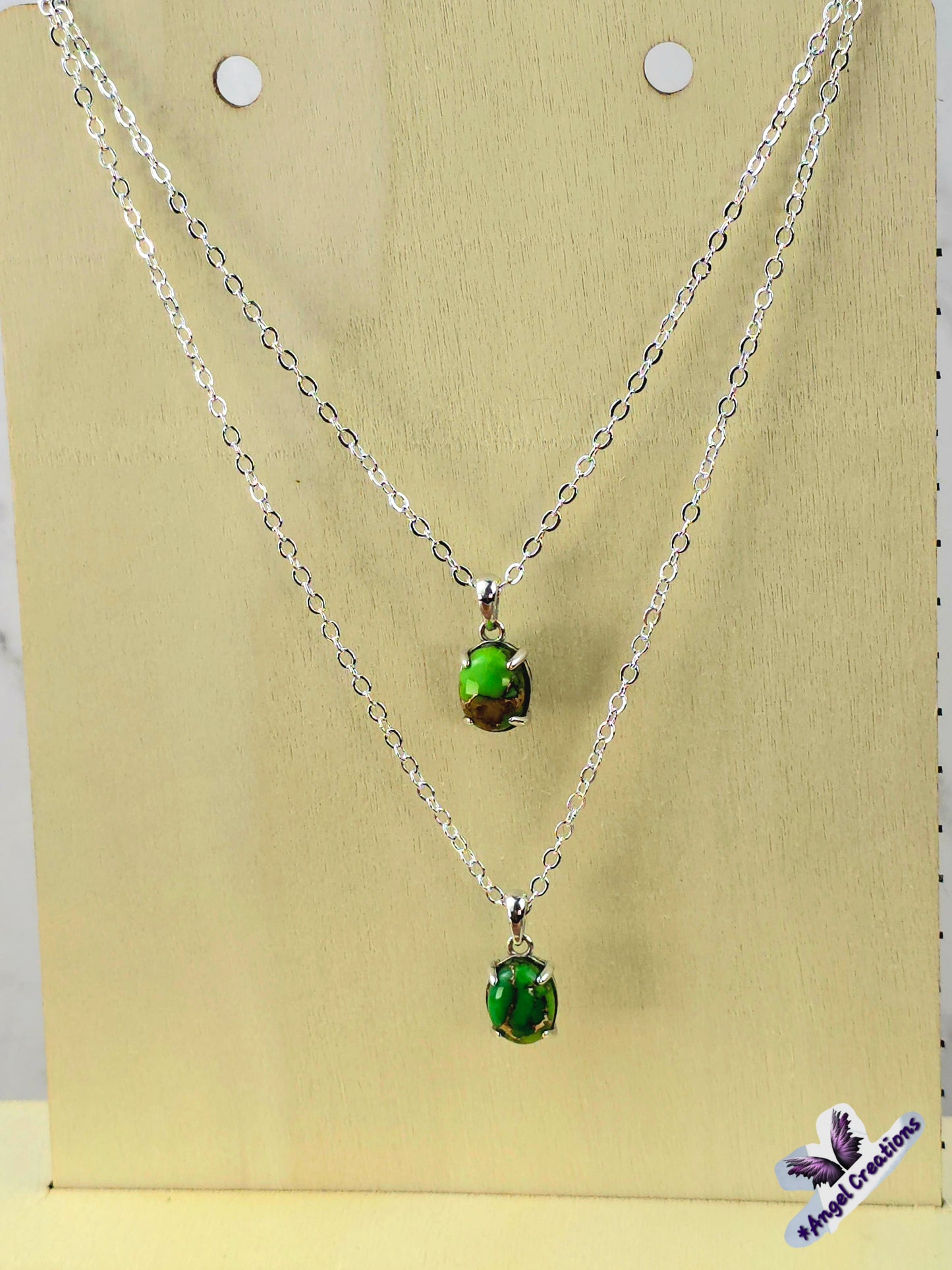 Sterling Silver Necklace Featuring A Turquoise Stone.