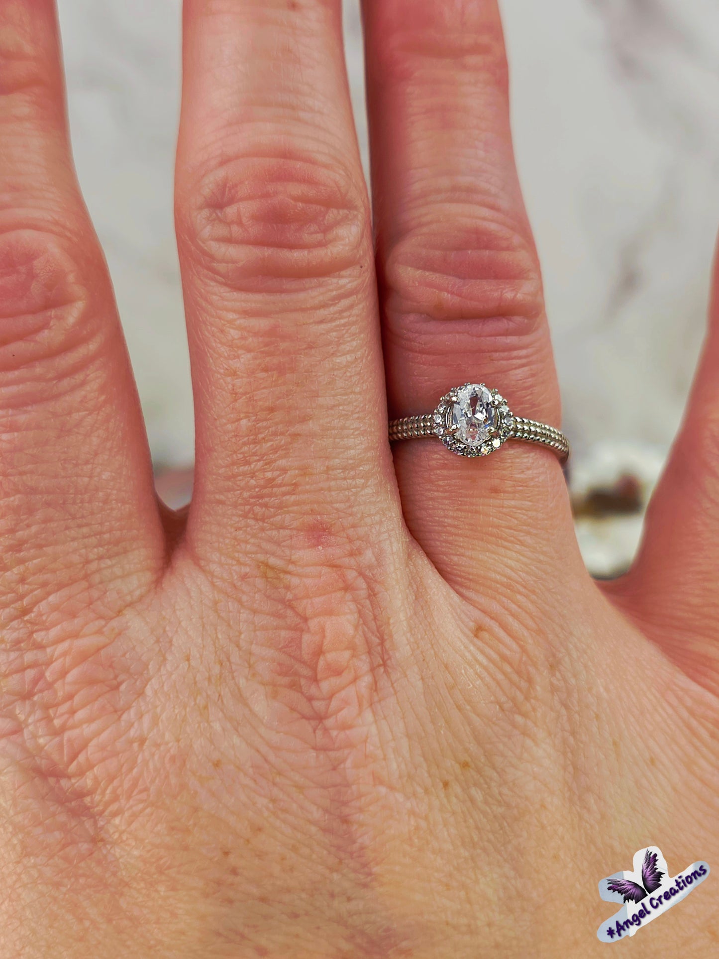 Sterling Silver Ring With Clear Oval Cubic Zirconium Gemstone